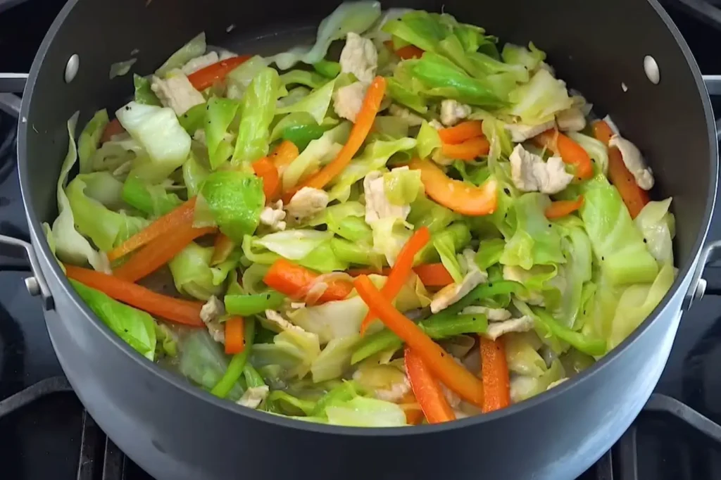 Ultimate Hmong Cabbage and Chicken Recipe: Flavorful & Easy 1 Hmong Cabbage and Chicken dish in a pan