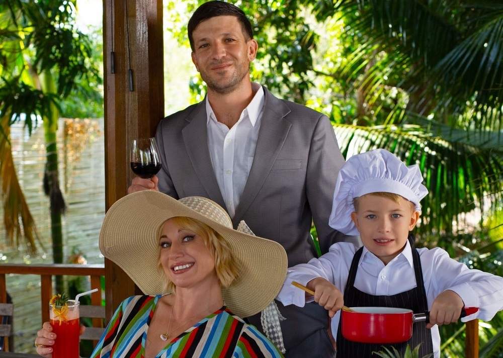 The Mayerhoffer family smiling together during their travels