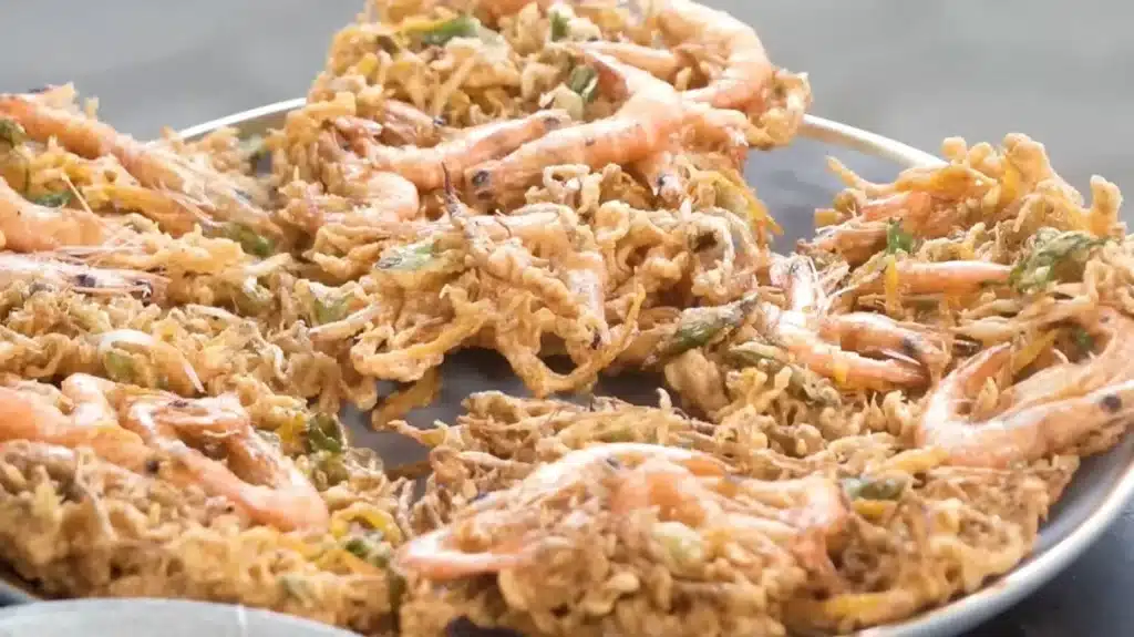 How to Make Sweet Potato Ukoy With Palabok Recipe 3 Plate of sweet potato ukoy with shrimp fritters