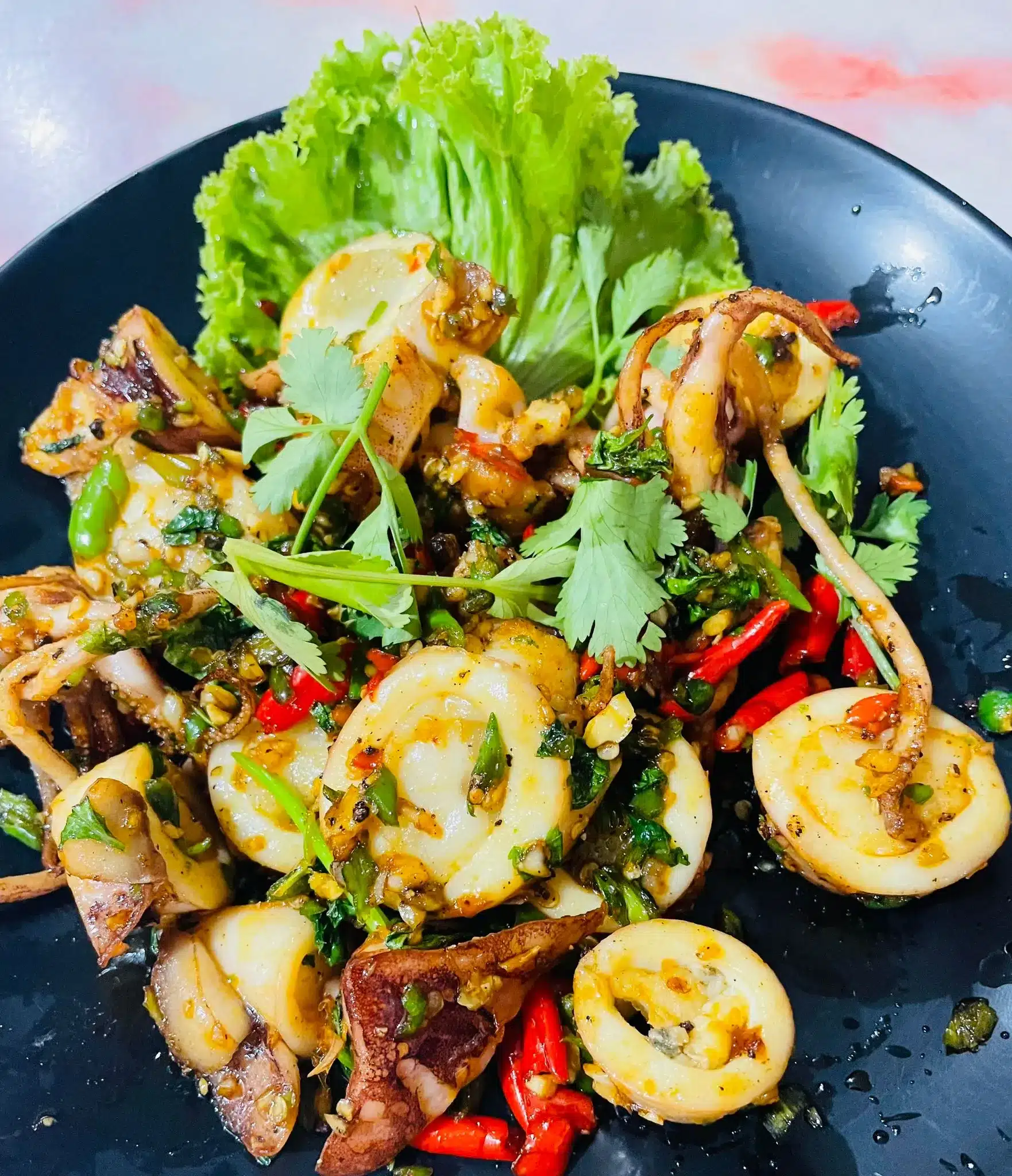 Fried squid in a fresh chili and garlic sauce.