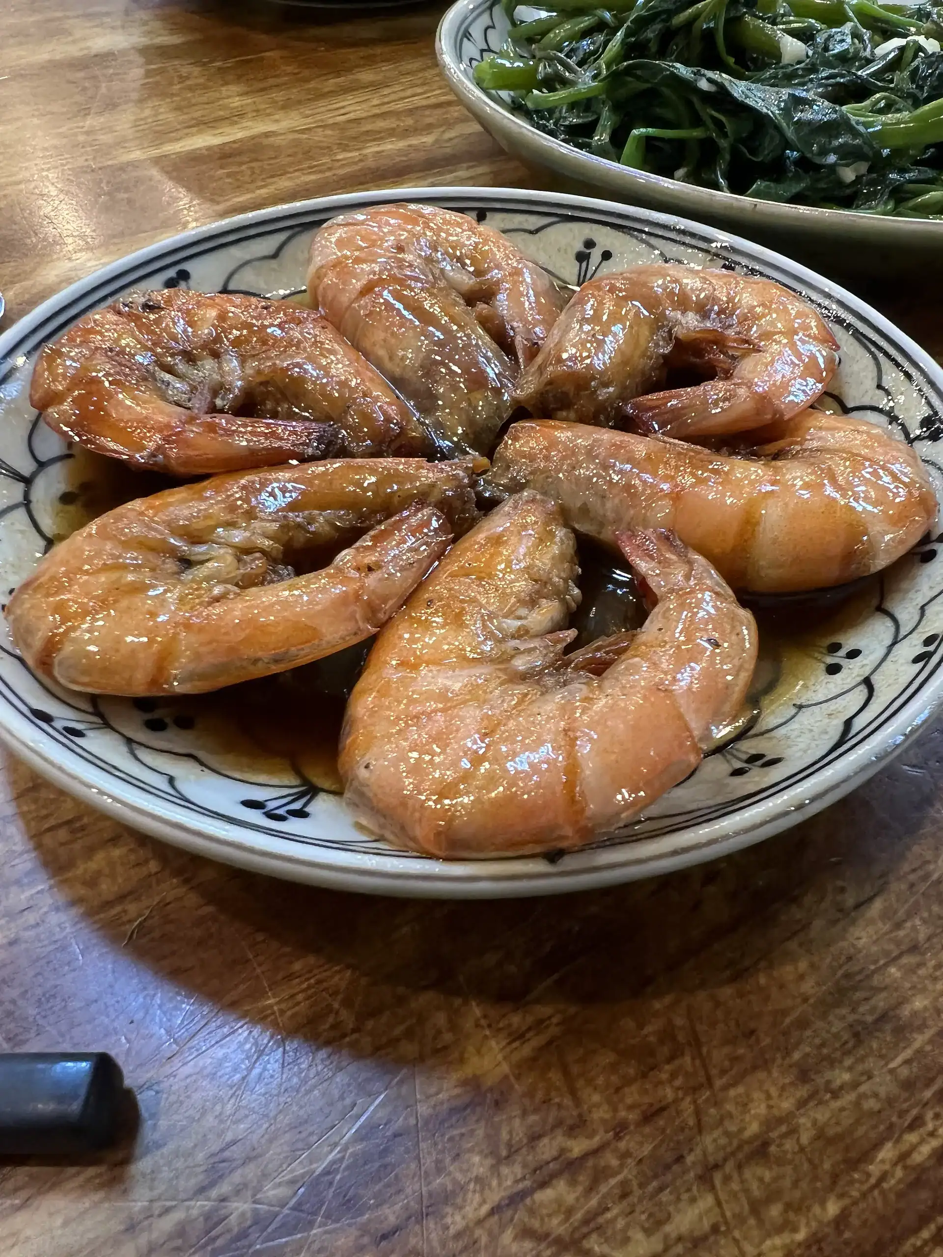 Discover Da Nang in 2025: The Most Comprehensive Travel Guide to Vietnam’s Coastal Gem 9 Succulent shrimp cooked to perfection on a decorative plate, perfect for seafood lovers and tropical cuisine enthusiasts.
