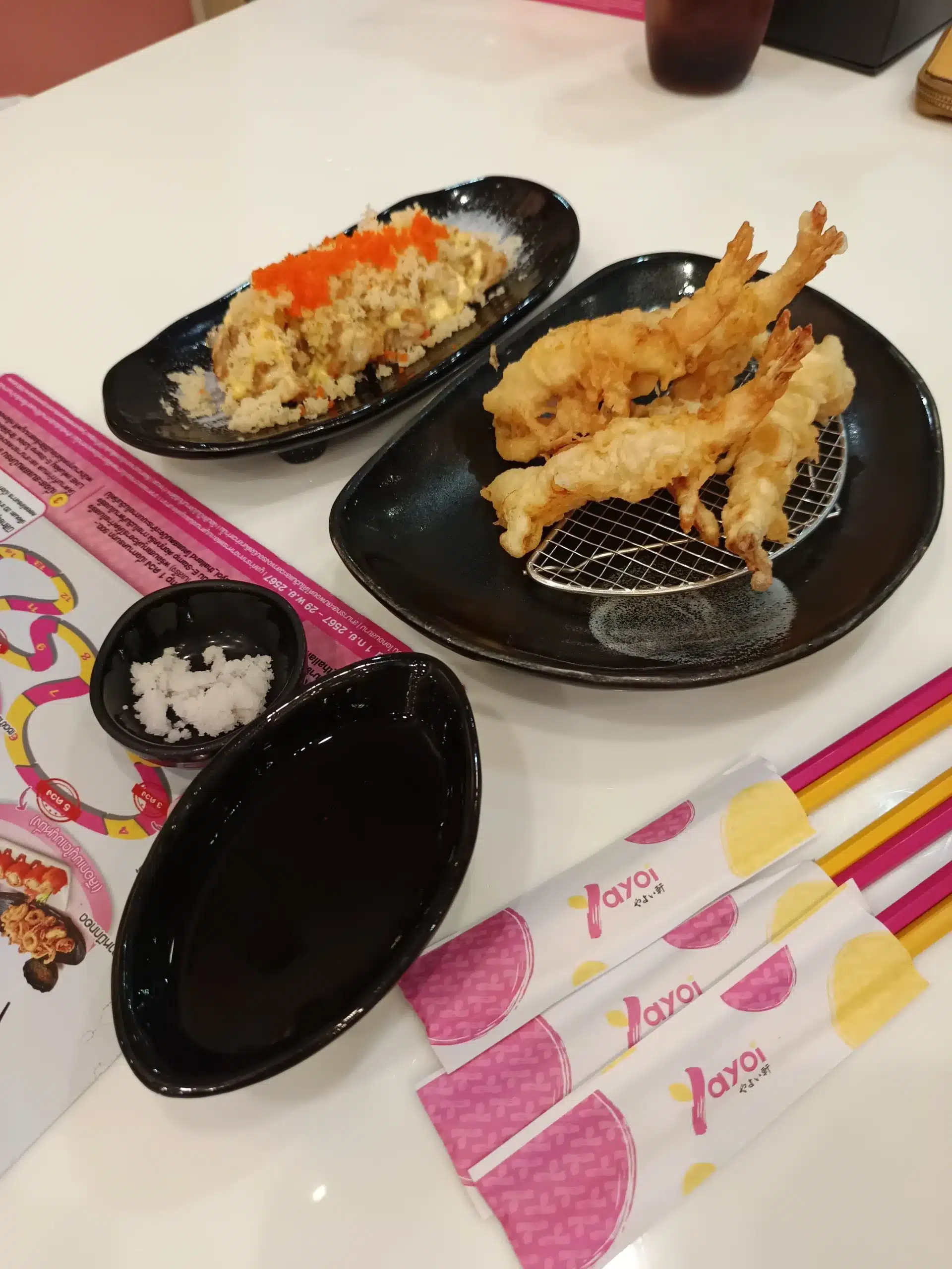 The Mayerhoffer family table spread at Yayoi Hua Hin with fried rice and tempura prawns