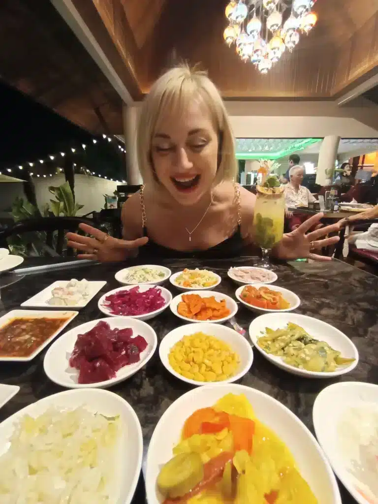 Natalia mayerhoffer at ogen hua hin, with various tapas style dishes in from of her