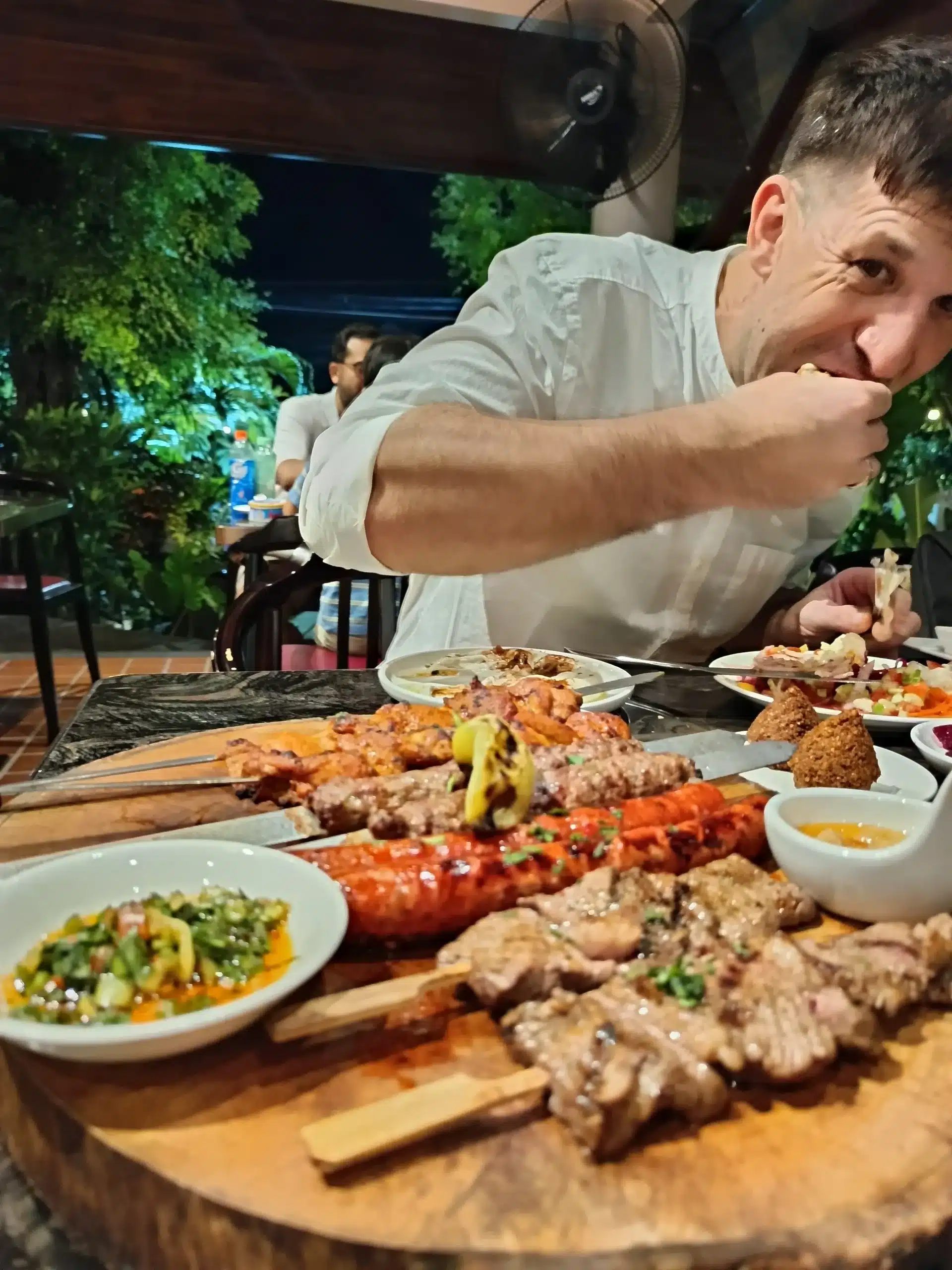 Oliver Mayerhoffer enjoying authentic Israeli meat kebabs at Ogen Hua Hin