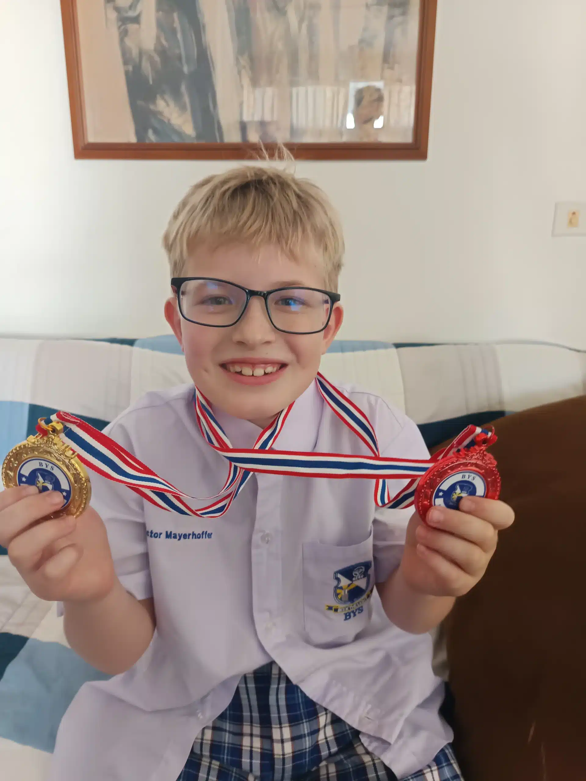 Victor's sports day medals at Yamsaard School
