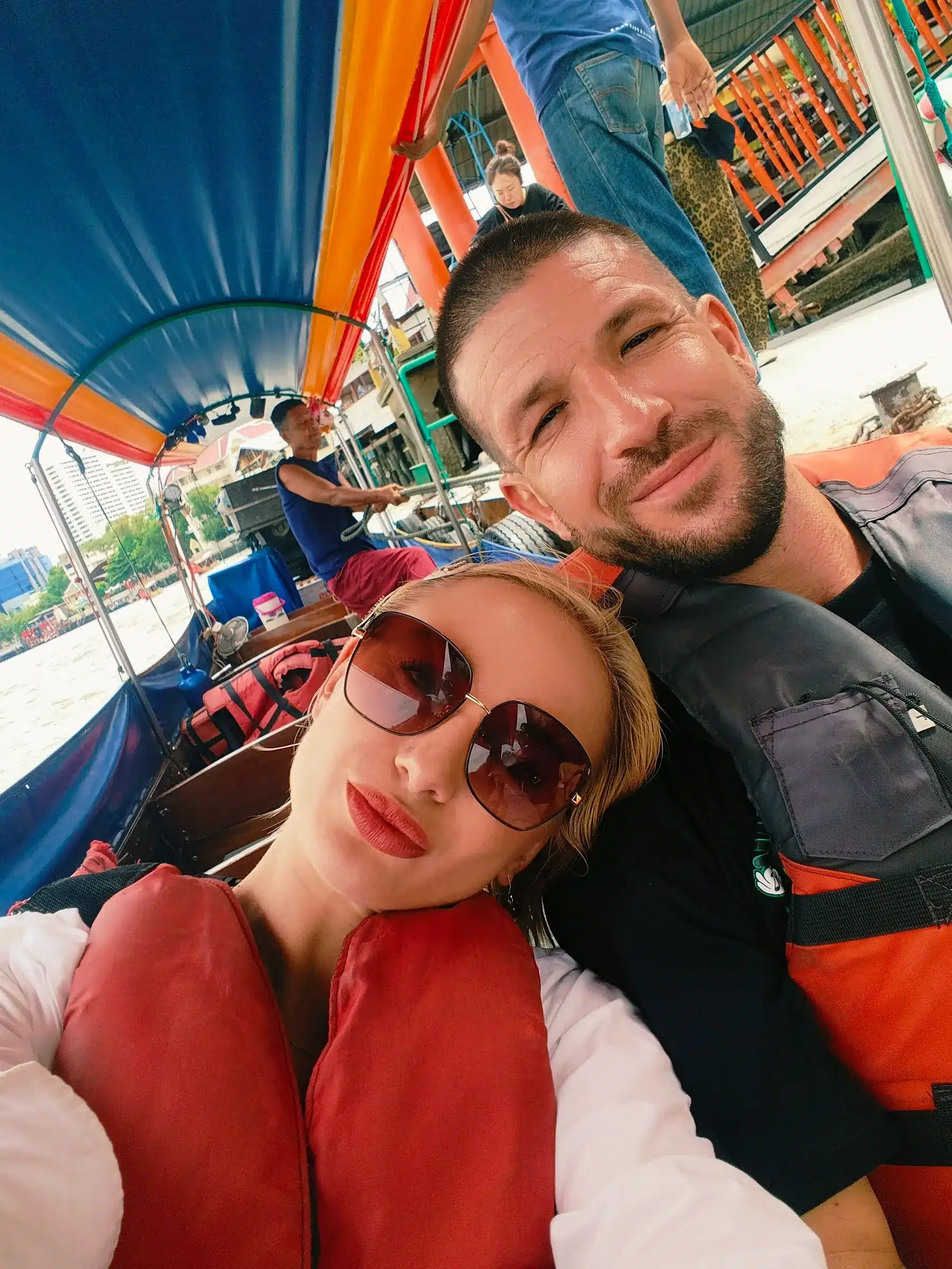 Oliver and Natalia Mayerhoffer on a traditional boat in Bangkok last week.