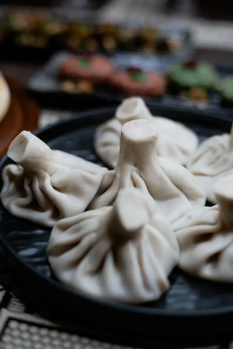 How to eat Khinkali dumplings, close up of Khinkali