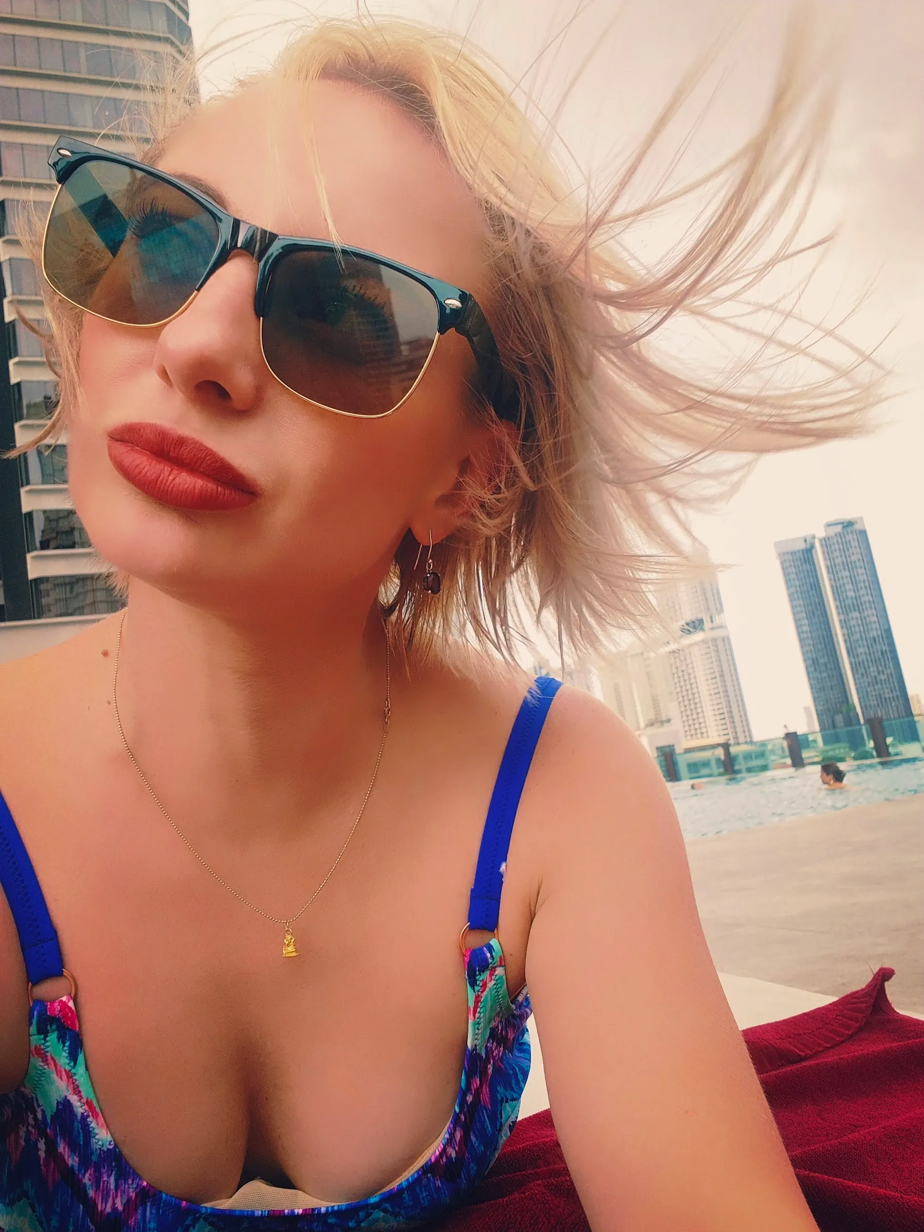 Natalia Mayerhoffer navigating a boat in Bangkok