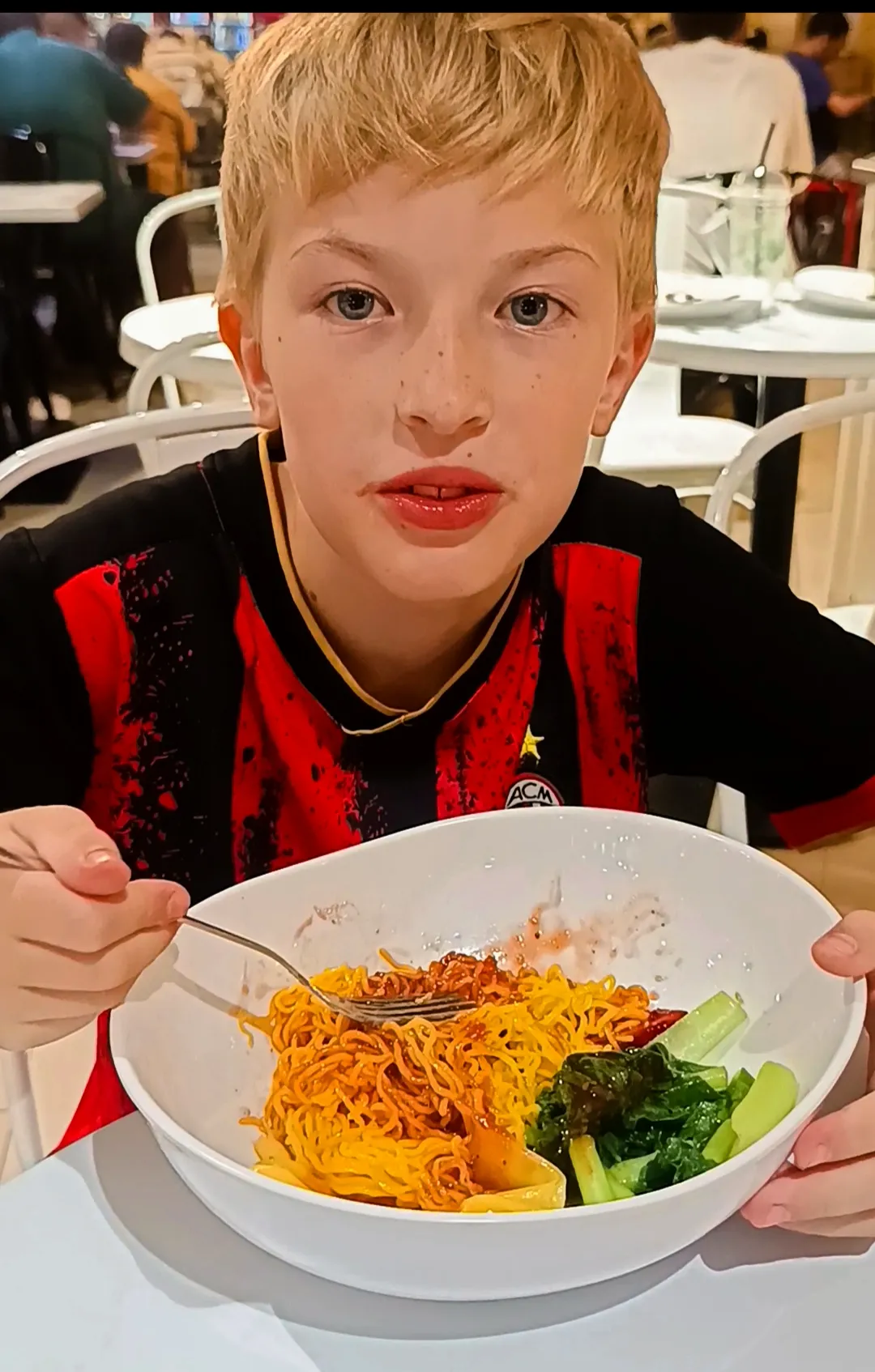 Victor Mayerhoffer enjoying a hot plate of Pork Rad Na at Market Village Hua Hin.