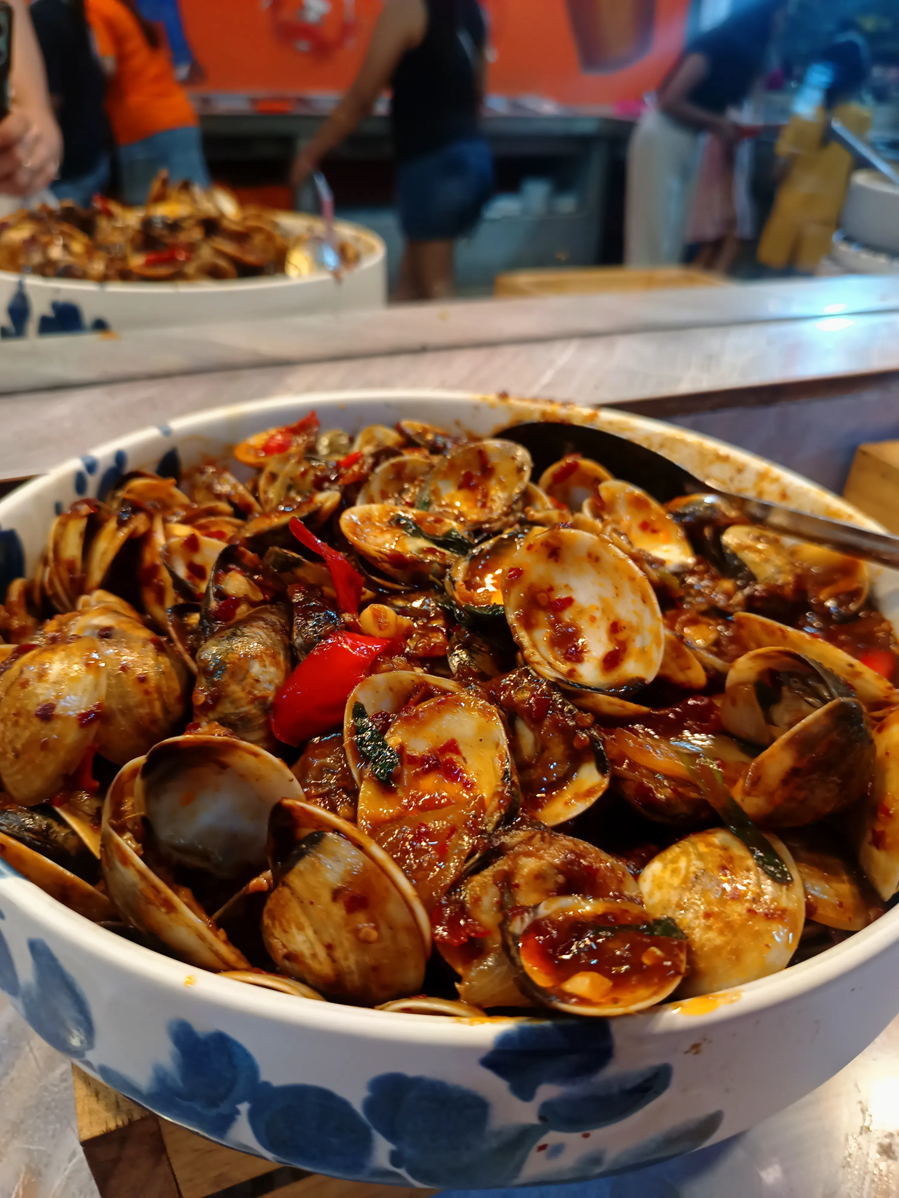 Thai-spiced mussels ready to collect at Mr. Dum self-serve buffet line