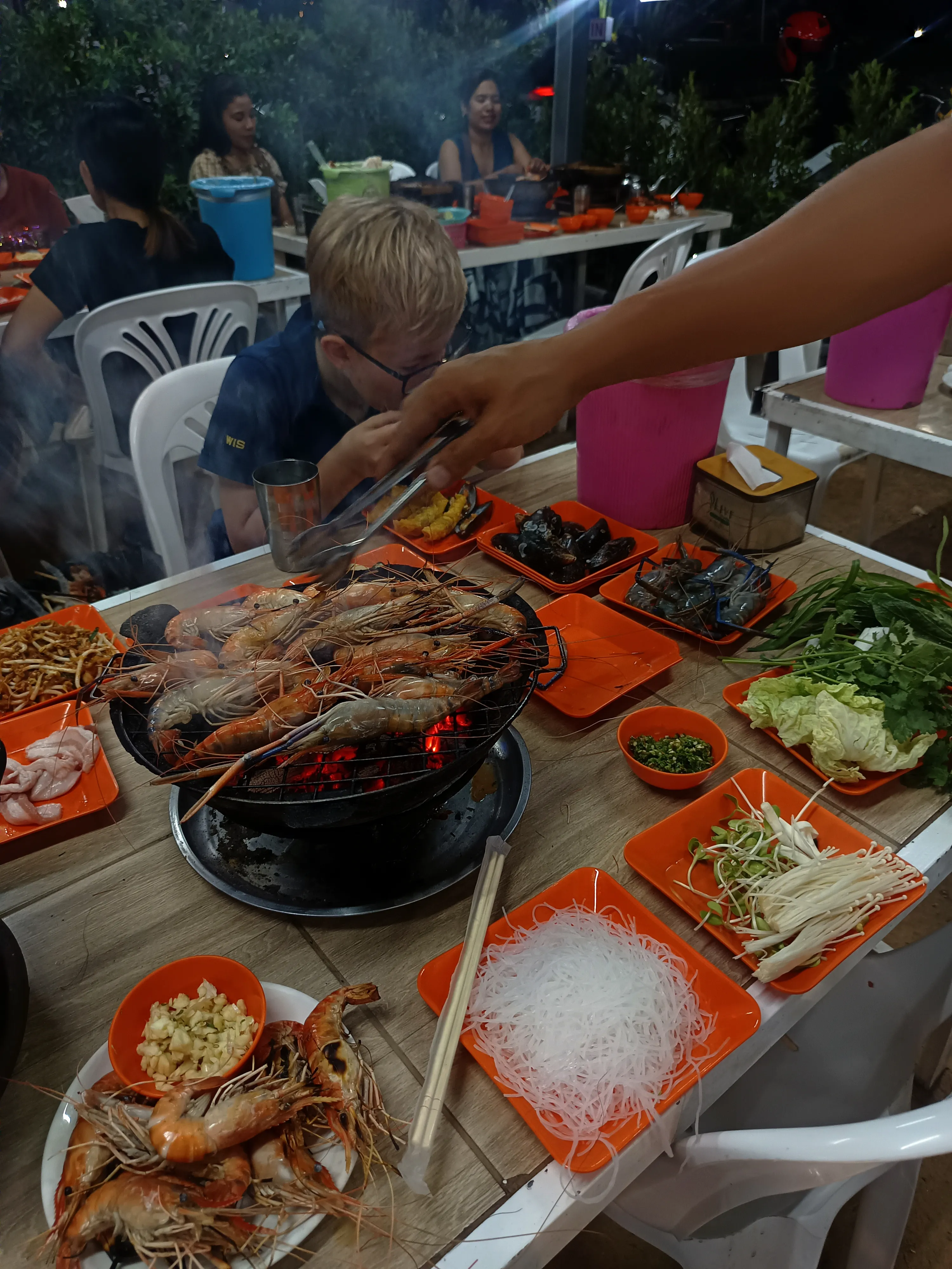 Mr. Dum Korean BBQ dining room on Koh Samui—charcoal smoke and communal tables