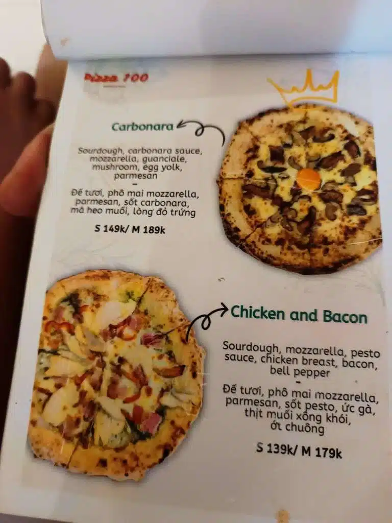 Pizza 100 menu page listing Carbonara and Chicken and Bacon pizzas