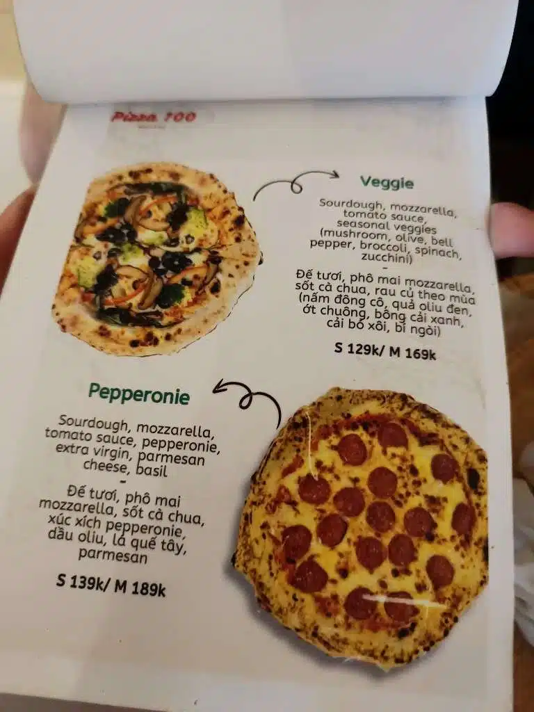Pizza 100 menu page listing Veggie and Pepperoni pizzas