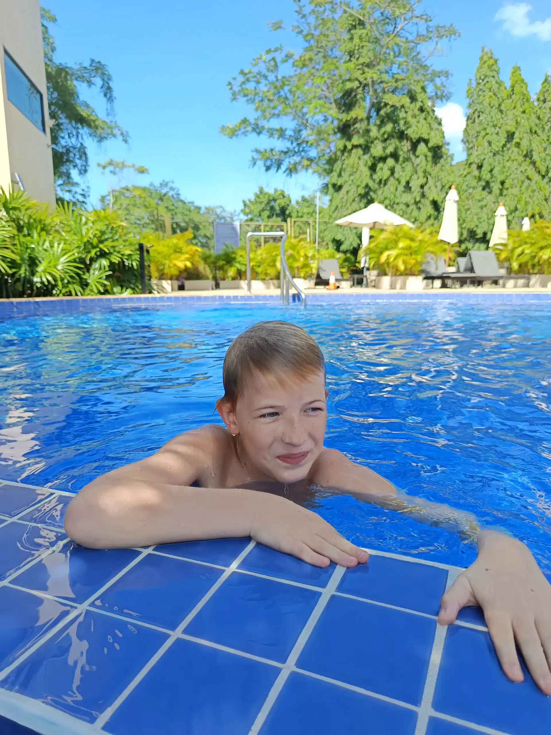School-age child at Lamai villa pool Koh Samui